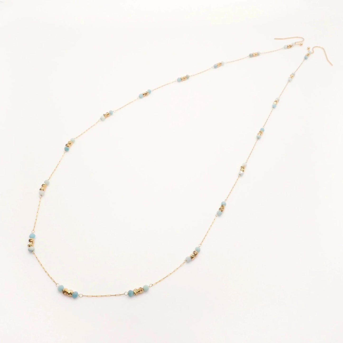 bijou d'oreilles pour femme original et singulier en acier inoxydable et perles naturelles bleues