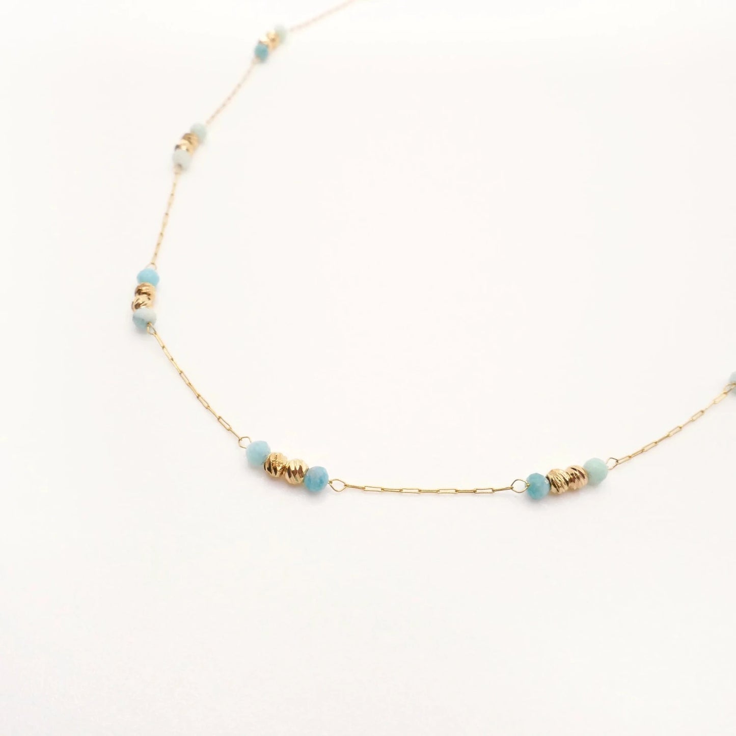bijou d'oreilles pour femme original et singulier en acier inoxydable et perles naturelles bleues