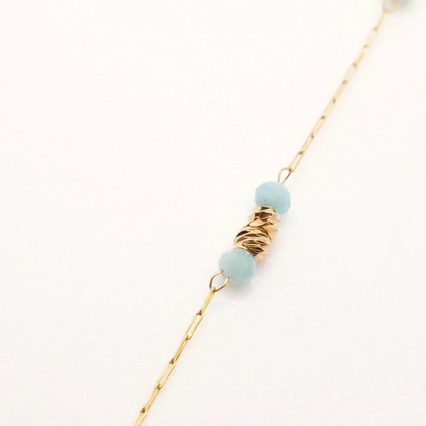 bijou d'oreilles pour femme original et singulier en acier inoxydable et perles naturelles bleues