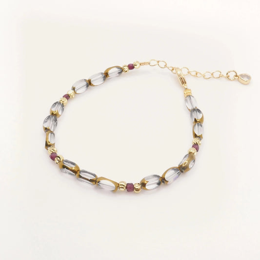 Bracelet fin pour femme en perles dorées et transparentes