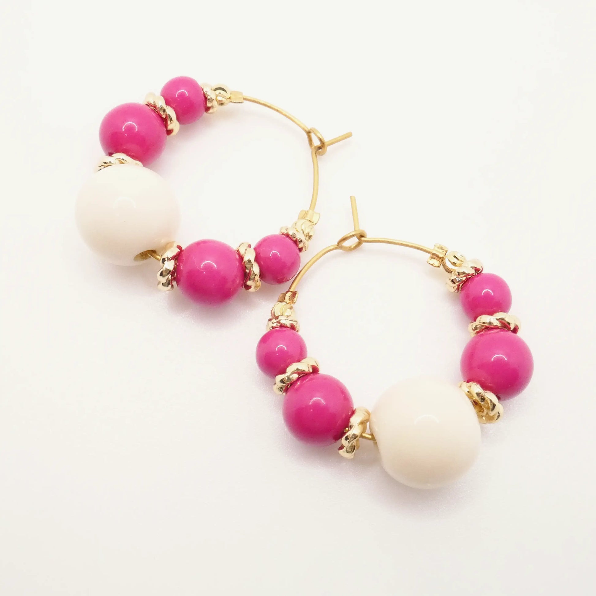 boucles d'oreilles perles roses