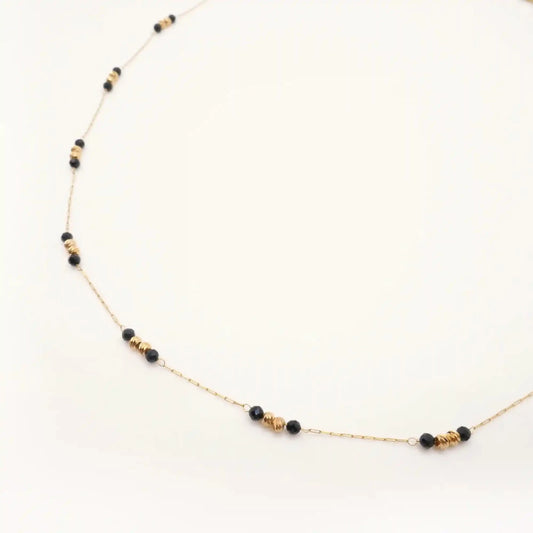 fin collier de perles noir et or de longueur 45 cm 