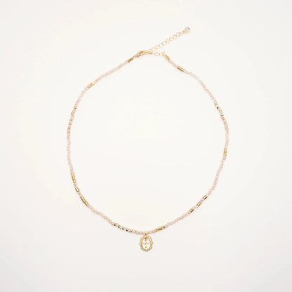 collier croix perles pour femme avec pendentif médaillon or