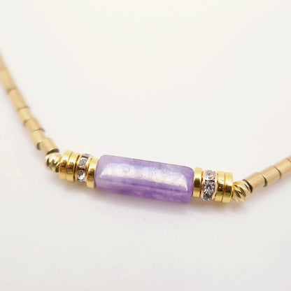 collier en perles fines en or et perle violette d'Améthyste